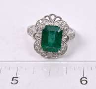 Radiant Lady's Platinum Ring with Emerald and Diamonds