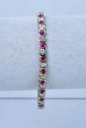 Sterling Silver Alternating Clear And Pink Gemstone Bracelet.