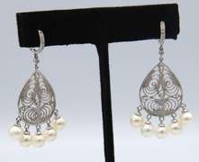 6MM CULTURED PEARL AND DIAMOND CHANDELIER EARRINGS.