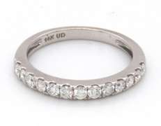 LADIES 14KT WHITE GOLD DIAMOND WEDDING BAND.