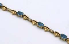 LADIES 14 KT YELLOW GOLD TOPAZ AND DIAMOND BRACELET