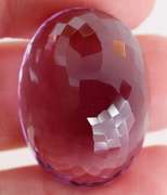 Substantial oval cut 51.91ct violet Amethyst