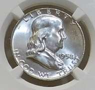 1958-D Sil Franklin Hf NGC MS-64-FBL near GEM.   NOTE:  The horozontal lines on the Liberty Bell, on the reverse,  are the high-points of the coin.  Consequently, only a very small percentage of examples show continuous and uninterrupted grooves (Full Bell Lines; FBL) on every line.  Hence, the designation acknowledges the rarity and expanded value.