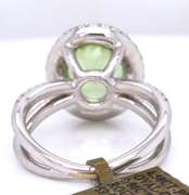 Dreamy 18kt Peridot Oval Cut and RBC Diamond Halo Double Shank Ring