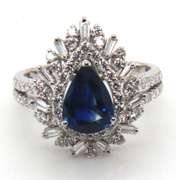 Impeccable Blue Sapphire and Diamond Halo Ring with 18k Stamped White Gold