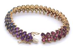 Ladies 14k gold bracelet with multi color gem stones