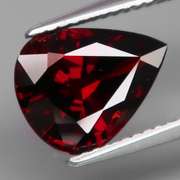Mesmerizing 4.18ct blackish red Garnet pear