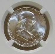 1956 Sil Franklin Hf NGC MS-64-FBL near GEM.   NOTE:  The horozontal lines on the Liberty Bell, on the reverse,  are the high-points of the coin.  Consequently, only a very small percentage of examples show continuous and uninterrupted grooves (Full Bell Lines; FBL) on every line.  Hence, the designation acknowledges the rarity and expanded value.