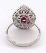Mesmerizing 18k Stamped White Gold Ruby Teardrop Ring rimmed with Sparkling Diamonds