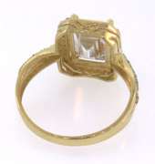 Exciting 14kt Yellow Gold Emerald Cut CZ Gemstone Ring