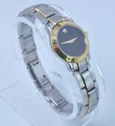 Movado Black Dial 18k Gold Bezel. Pre-Owned.