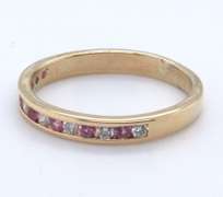 Charming Yellow Gold Pink Sapphire and Diamond Channel Set Band