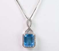 Magnificent Emerald Cut Blue Topaz in 14k White Gold with Diamonds