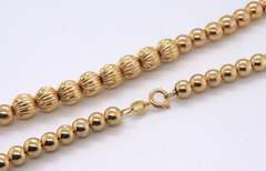 Attractive 18kt Graduated Gold Bead Necklace