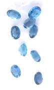 Great Group of 9 Oval Cut London Blue Topaz Gemstones, 10.93cts