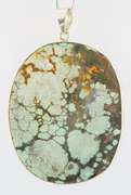Striking well marbled 135.54ct Turquoise cabochon sterling pendant