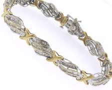 10K GOLD BEAUTIFUL TWO TONE LADIES DIAMOND BRACELET.