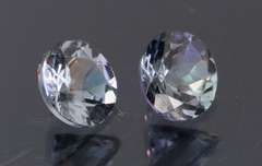 Glittering 1.34ct pair of silvery blue Tanzanite