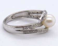 Elegant White Gold Crossover Pearl and Diamond Ring