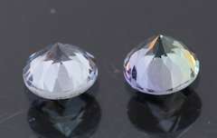 Glittering 1.34ct pair of silvery blue Tanzanite