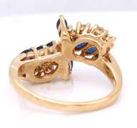 Powerful Marquise Sapphire and Diamond Bypass Ring