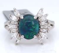 Masterpiece Platinum Oval Cut Black Opal and Diamond Ring
