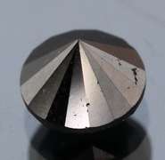 Exquisite 1.75ct smooth cut Black Diamond solitaire