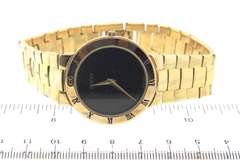 Gucci Gold Plated Black Dial Watch
