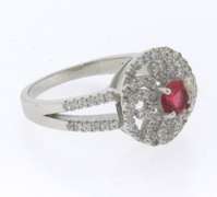 Sterling Silver Halo Ring with Pink Gemstone Surrounded by Cubic Zirconias