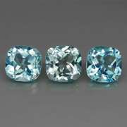 Large 16.62ct vivid blue cushion cut Topaz set