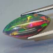Magnificent 2.78ct full body flashing Black Opal