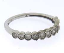 Brilliant White Gold Illusion Set Diamond Band