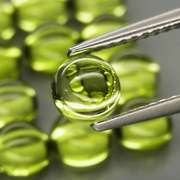 Pristine 10.73ct 16pc lime green Peridot set