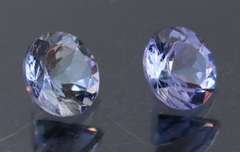 Glittering 1.46ct pair of silvery blue Tanzanite