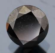 Exquisite 1.75ct smooth cut Black Diamond solitaire