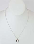 Sterling Silver Opal Necklace With Dark Blue Gemstones.