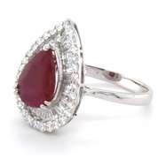 Mesmerizing 18k Stamped White Gold Ruby Teardrop Ring rimmed with Sparkling Diamonds