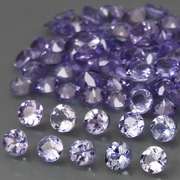 Heavy flashing 5.06ct diamond cut Tanzanite set