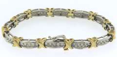 14k white and yellow gold ladies diamond bracelet xo design