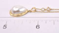 Pretty "Pearl - like" Pendant in 14K Yellow Gold