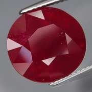 Large 13.15ct oval cut rich blood red Ruby