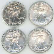 4 Assorted Superb Gem BU $1 American Silver Eagle. Capsules