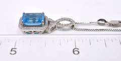 Magnificent Emerald Cut Blue Topaz in 14k White Gold with Diamonds