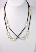 Incredible Black Bead Gemstone Necklace with Clear Geometric Gemstones
