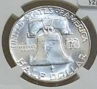 1956 Sil Franklin Hf NGC MS-64-FBL near GEM.   NOTE:  The horozontal lines on the Liberty Bell, on the reverse,  are the high-points of the coin.  Consequently, only a very small percentage of examples show continuous and uninterrupted grooves (Full Bell Lines; FBL) on every line.  Hence, the designation acknowledges the rarity and expanded value.