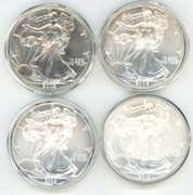 4 diff. Superb Gem BU $1 American Silver Eagles in Capsules