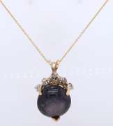 Stunning Cabochon Cut Purple Star Sapphire and Diamond Pendant on Chain