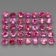 Ravishing 8.35ct violet pink Rhodolite Garnet set