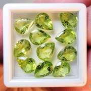 Pear cut 11 piece Peridot set weighing 10.80cts