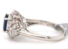 Remarkable White Gold Blue Sapphire w Mixed Cuts around Diamond Ring